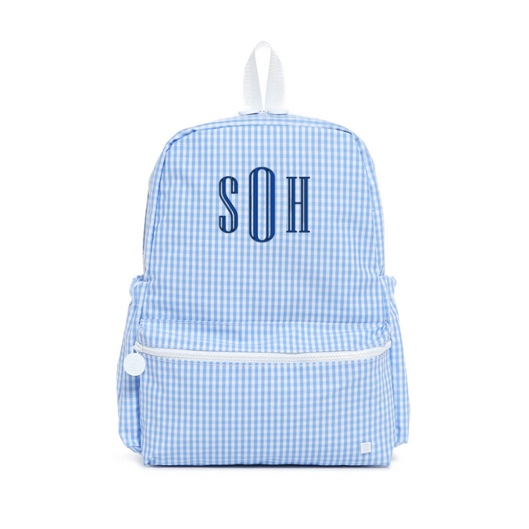 Blue checkered backpack with 'SOH' monogram on a white background