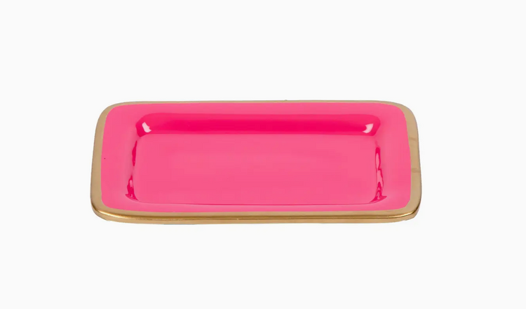 Pink rectangular tray with gold rim on a white background