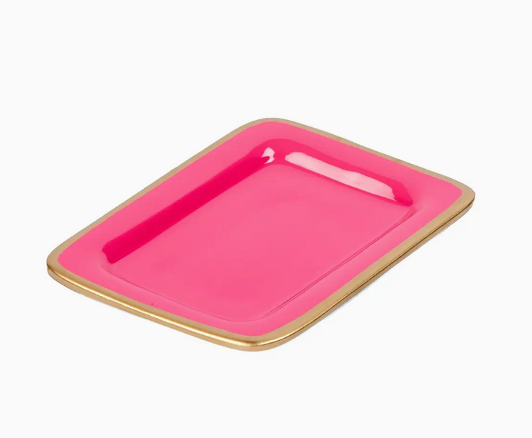 Pink tray with gold rim on a white background