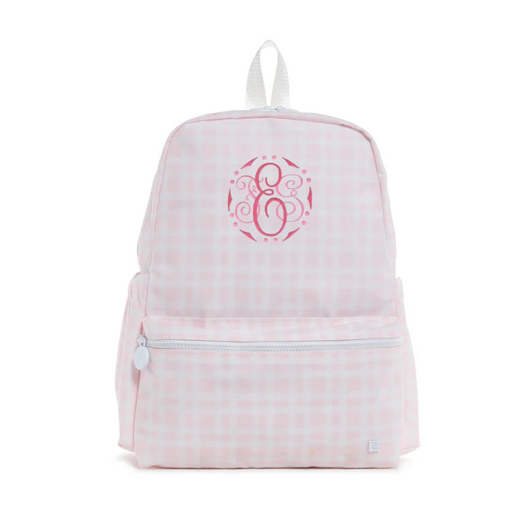 Pink checkered backpack with a monogram on a white background
