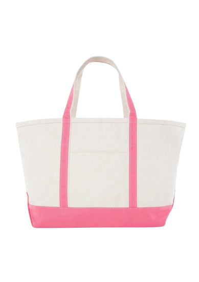A canvas boat tote with a navy blue base and white upper part, featuring two handles and a front exterior pocket.