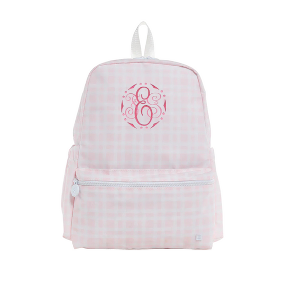 Pink checkered backpack with a monogram on a white background