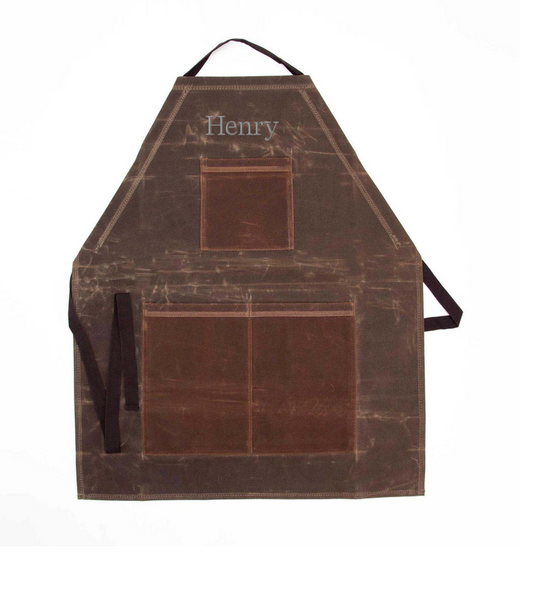 Waxed Canvas  apron with 'Henry' branding on a white background
