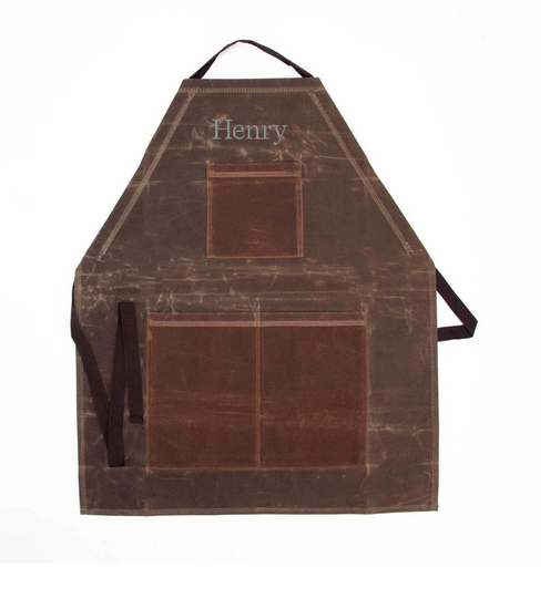Waxed Canvas  apron with 'Henry' branding on a white background